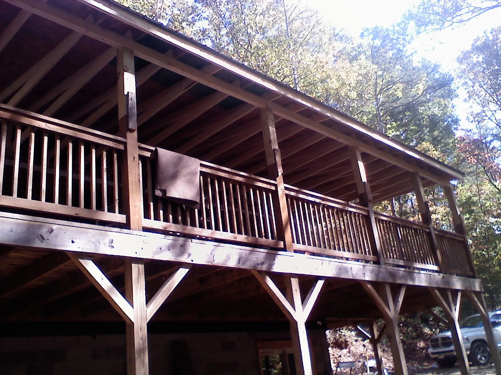 Timber framing under a new elevated porch and deck — Roof Leak Repair in La Fayette by Roofing Brothers